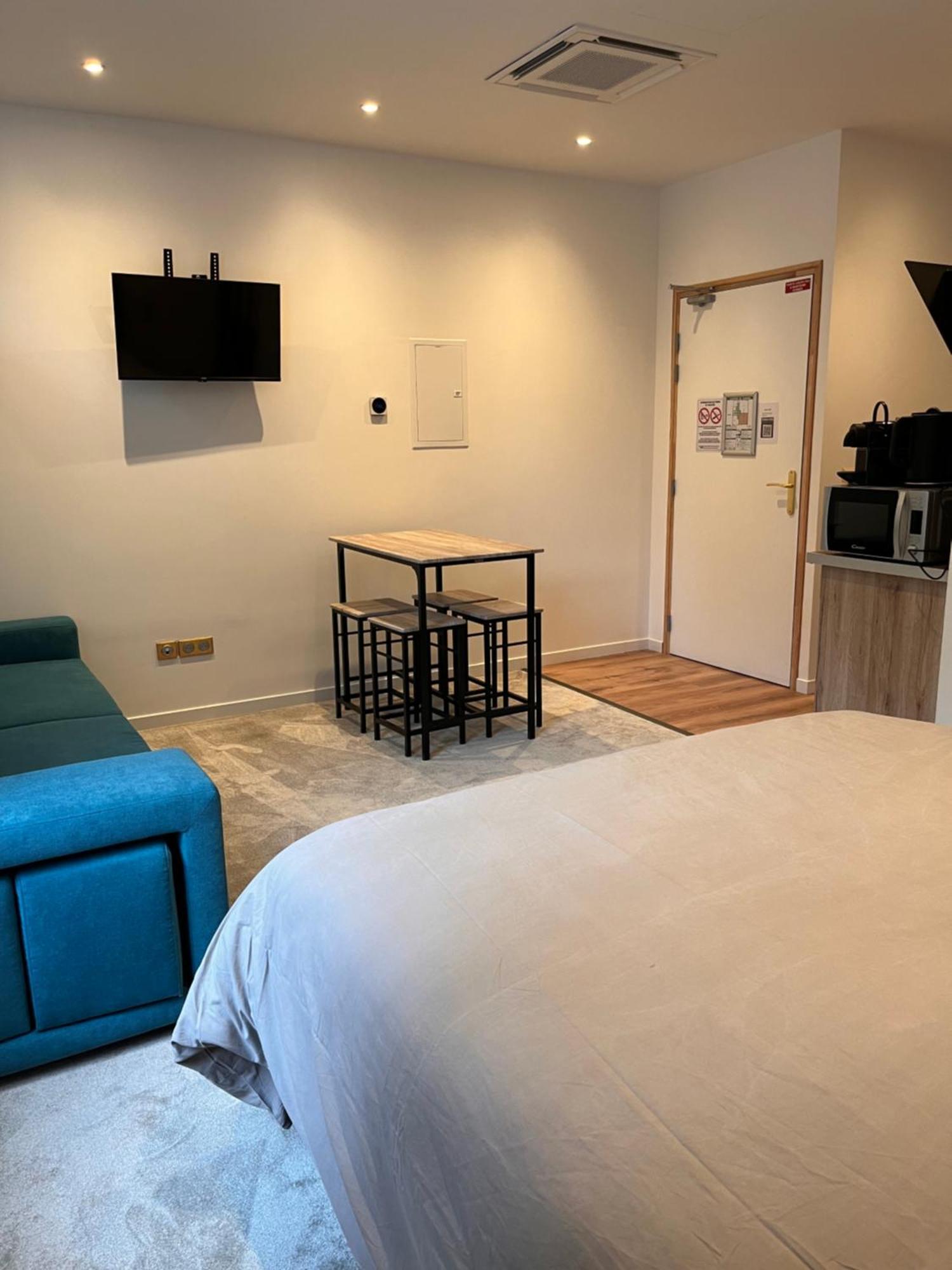 Parmain Hdg Hotel Gare De L'Isle Adam Appart'S Hotel المظهر الخارجي الصورة